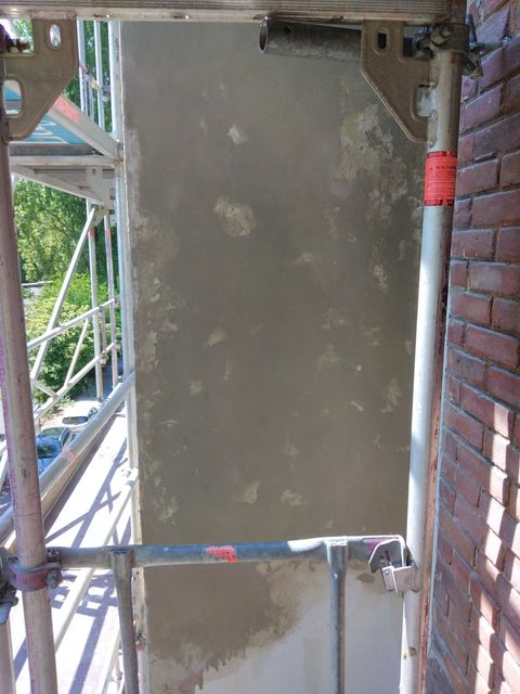 Muurherstel op hoogte vanaf de steiger